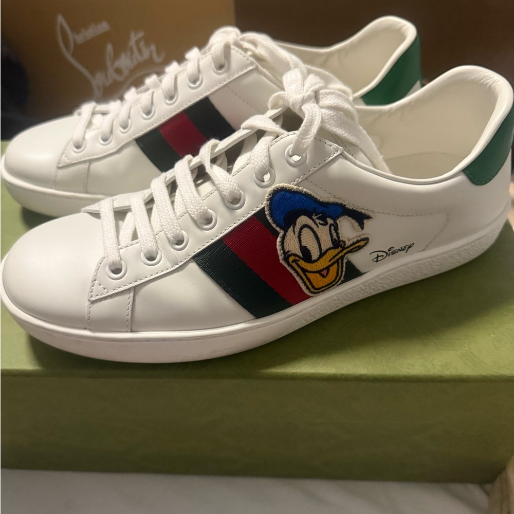 Gucci Ace Disney Sneakers size 38 with box and dust bag.  In great condition.